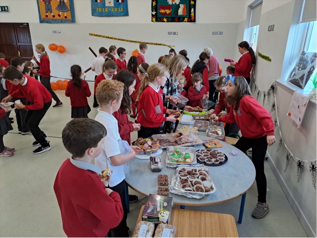Pupils at a table during a student council event